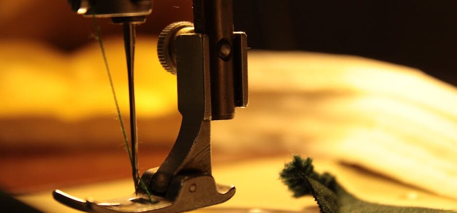 bernina - Detailed view of a sewing machine needle stitching fabric, highlighting craftsmanship.