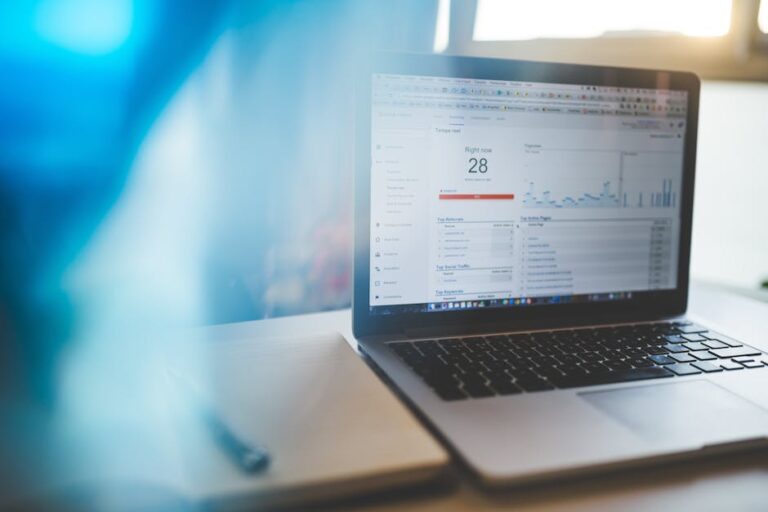 everysize - Laptop displaying Google Analytics in a modern workspace, highlighting digital analytics