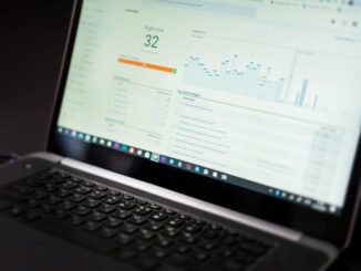 everysize - A laptop displaying an analytics dashboard with real-time data tracking and analysis too