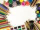 modulor berlin - Creative flat lay of colorful art supplies including paints, pencils, and brushes o