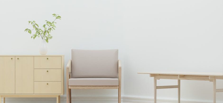 möbel heinrich kirchlengern - A serene minimalist living room with wooden furniture and a plant.
